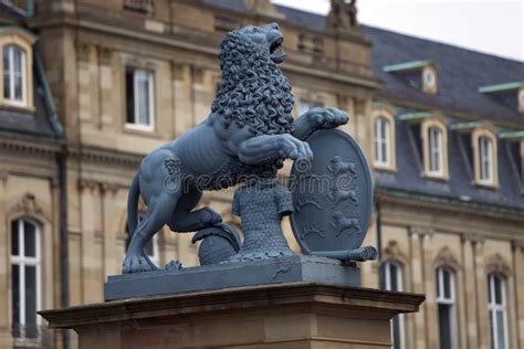 Lion Sculpture With Crest In Front Of The Main Entrance Of The New