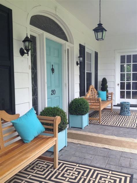 aqua blue front door with creamy white siding and black accents my house is currently ben moore