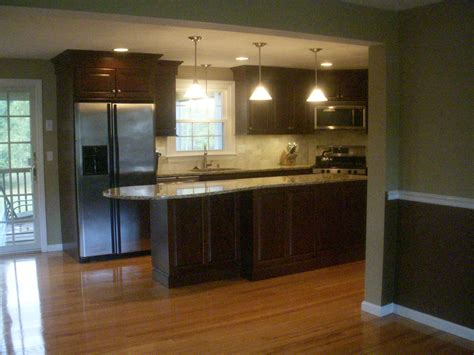This dramatic wood kitchen floor is made from tanzanian wenge hardwoods. Hardwood floors for Kitchens | Kitchen flooring, Hardwood ...