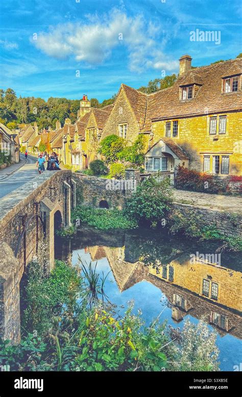 Village Of Castle Combe In The Cotswolds Wiltshire View Looking Over