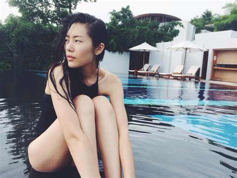 Campaign Protagonist Liu Wen Wearing The Dunes Swimsuit On Her Vacation