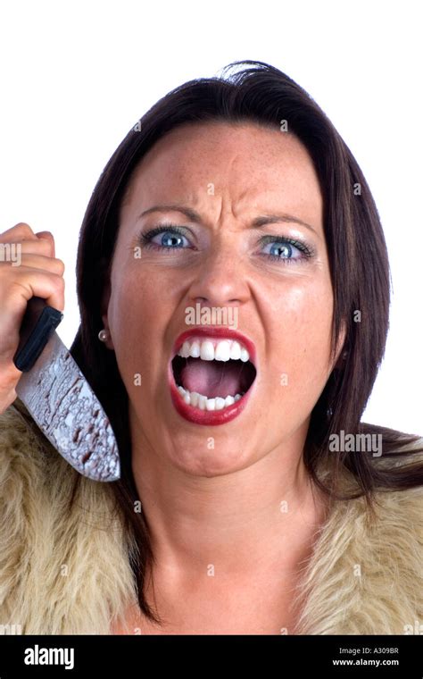 Angry Woman Wielding A Large Knife Stock Photo Alamy