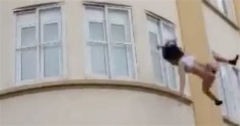 Dramatic Footage Shows Rescuers Catching Semi Naked Woman As She Jumps From Window Of Burning