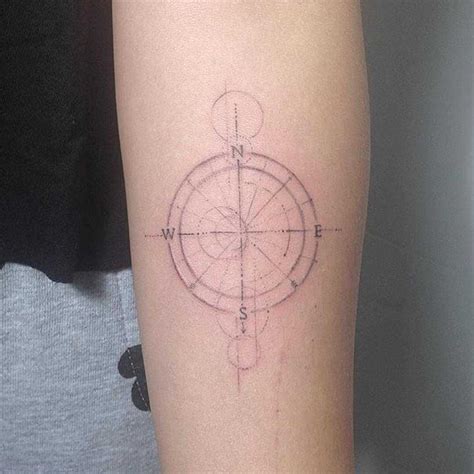 Single Needle Minimalist Compass Tattoo On The Forearm By Lindsay