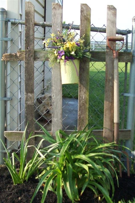 The fence is made of steel poles and chain link fabric which is. chain link | Chain link fence, Fence design, Backyard fun
