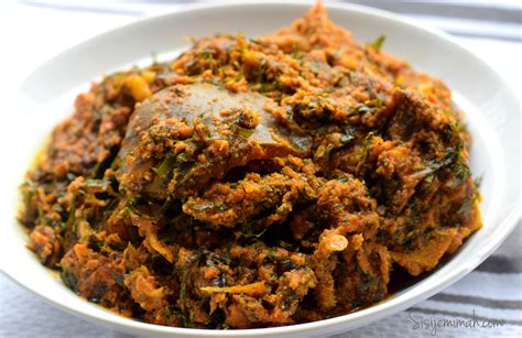Find out how to cook egusi soup with this egusi soup recipe. Egusi Soup with Okazi 4 - Sisi Jemimah