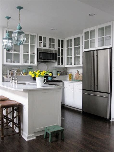 When designing your kitchen layout, consider where you'll need to install lights. 15 Creative Small Kitchen Design Tips