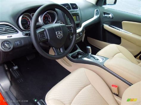 It's a family car, so get the family together for whatever awaits you. Black/Light Frost Beige Interior 2013 Dodge Journey SE ...