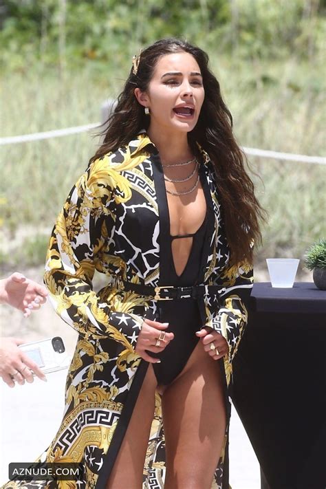 Olivia Culpo In A Barely There Black One Piece Swimsuit As She Arrives