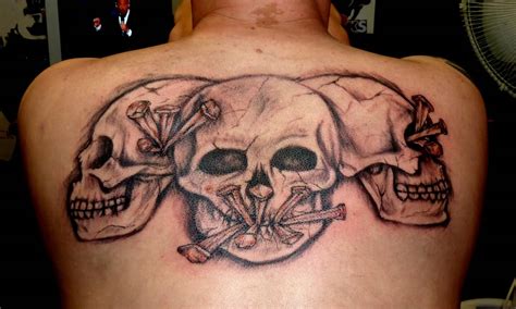 Good Vs Evil Skull Tattoo Designs