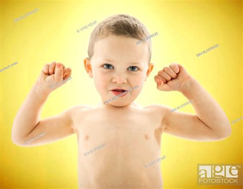 Caucasian Boy Flexing His Biceps Stock Photo Picture And Royalty Free