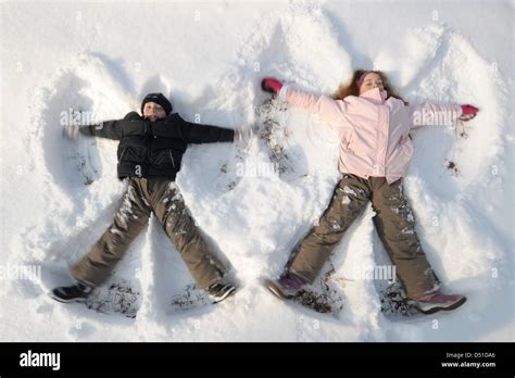 Two Children Make Snow Angels In Bayreuth Germany 02 December 2010