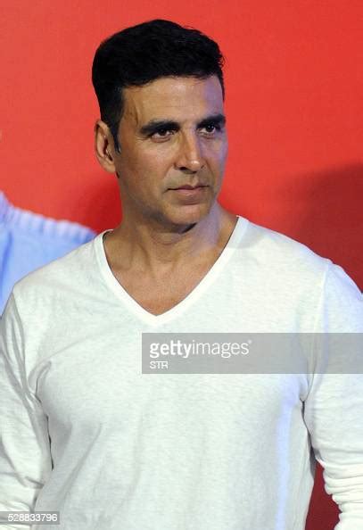 Indian Bollywood Actor Akshay Kumar Poses For A Photograph During A
