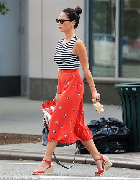 Olivia Munn Is The Height Of Chic In Flouncy Orange Skirt And Crop Top