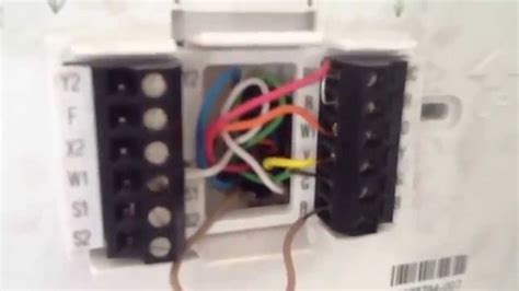 She did identify the wires are most likely: Heat Pump Thermostat Wiring Simply Explained - YouTube