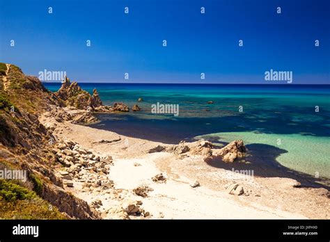 Spiaggia Di Rena Majore Beach With Azure Clear Water And Mountains