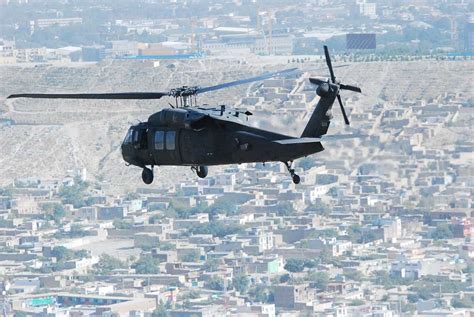 An Uh 60l Black Hawk Helicopter Crewed By 1st Lt Chuck Picryl Public