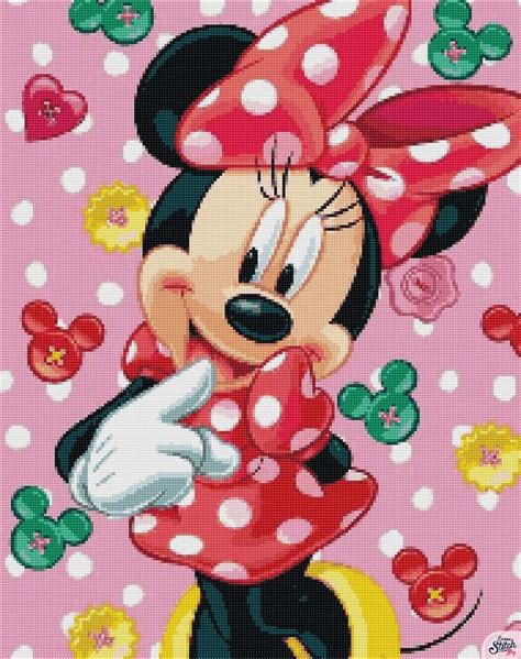 A Cross Stitch Minnie Mouse With Polka Dots On Its Head And Hands In