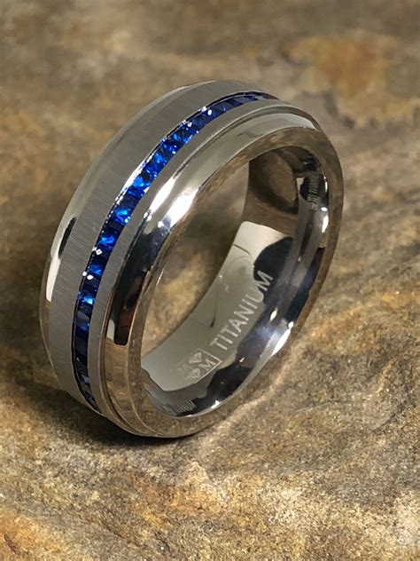 The superlative beauty of tiffany engagement rings is the result of our exacting standards and obsession with creating the world's most beautiful diamonds. Men's 8 MM band titanium wedding band engagement ring blue ...