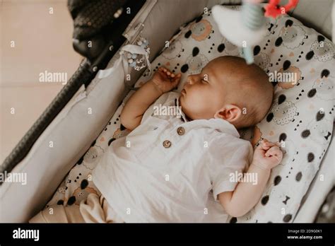 Child Newborn Baby Boy Asleep In Crib Stock Photo Alamy