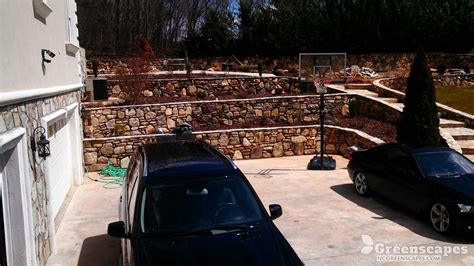 Doggett mountain building stone select ton $195.00 doggett mountain stone (bulk) ton $133.00 doggett mountain stone (palletized) ton $175.00 dove gray building stone ton $130.00 elk ashlar ton $285.00 elk ashlar jumbo (watauga) ton $313.00 elk ends (watauga) ton $120.00 elk oversized building stone ton $209.00 Doggett Stone Retaining Wall, Patio & Stairway Leicester NC