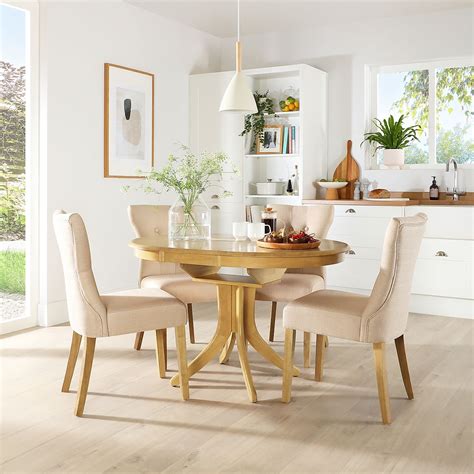 Hudson Round Oak Extending Dining Table With Bewley Oatmeal Fabric Chairs Furniture Choice
