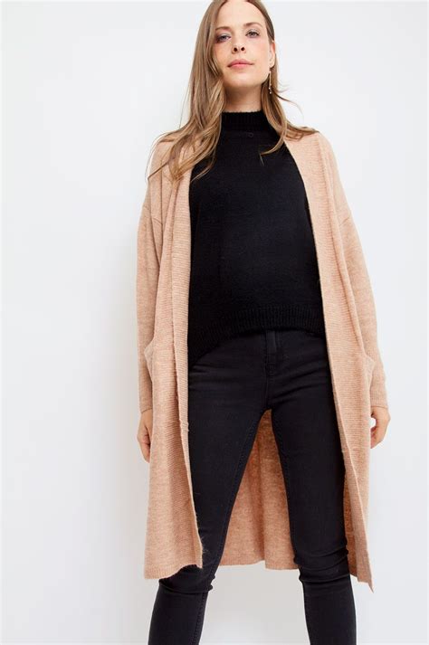 Sublime In Its Simplicity This Long Cardigan Balances Modern