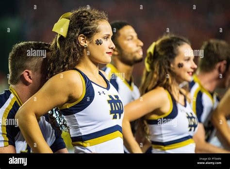 A Notre Dame Cheerleader During The Ncaa College Football Game Between