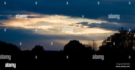 Beautiful Moody Landscape Skyscape With Opening In Clouds Showing