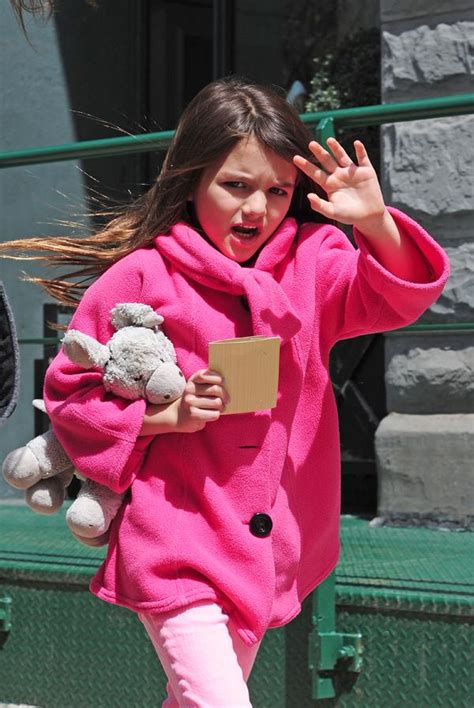 Woe Is Her Suri Cruise Wears Her Emotions On Her Designer Sleeves See All Of Her Sad Faces