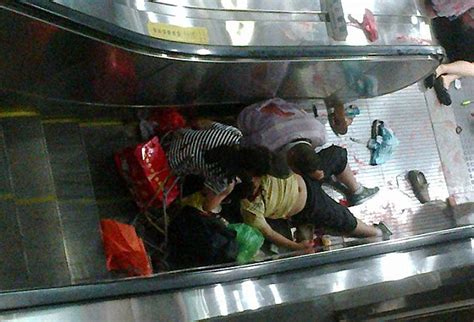 Beijing Escalator In Reverse Accident Boy 7 Crushed To Death In