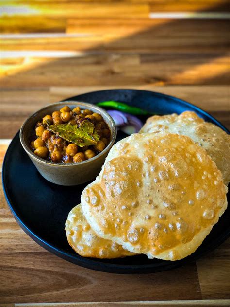 Chole bhature is a dish that is a hit at any party. Bhatura (Puffed Deep fried Indian Bread) : Spice Trip with ...