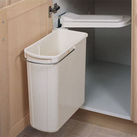 If your home has a small kitchen, or if you simply want to keep your household waste out of sight, a compact trash can that fits inside the cabinet beneath your sink is an unobtrusive solution that is economical on space. Rev-A-Shelf Pivot Out Rectangular Waste Bin - 20 Liter ...