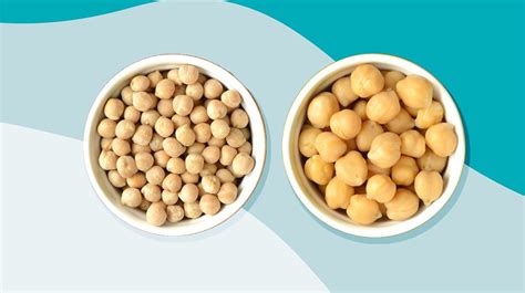 Two Bowls Filled With Chickpeas Next To Each Other On A Blue And White