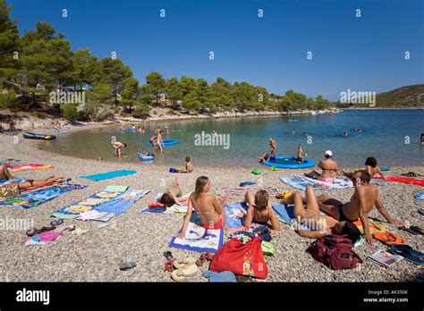 Crowded campsite beach in July Camp Vera Hvar Croatia Stock Photo - Alamy