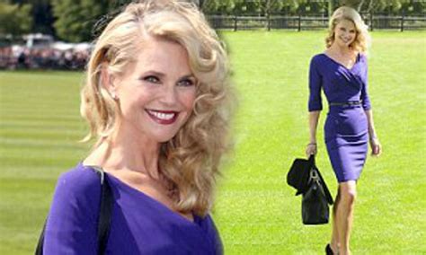 Christie Brinkley Draws Attention To Her Tiny Waist In A Tight Blue