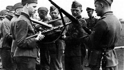 Men Of Wehrmacht Flemish Ss Volunteers Undergo Instruction In The Use