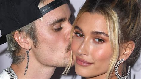 watch access hollywood interview justin bieber and wife hailey pack on the pda at first red
