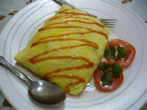 Nasi goreng pattaya or simply nasi pattaya is a southeast asian fried rice dish made covering or wrapping chicken fried rice, in thin fried egg or omelette. Diajar Masak: Nasi Goreng Pattaya