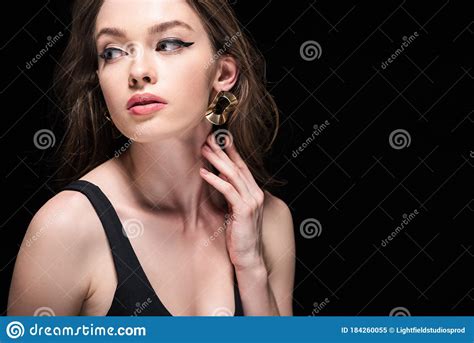 Girl Gently Touching Neck And Looking Away Isolated On Black Stock Image Image Of Relaxing