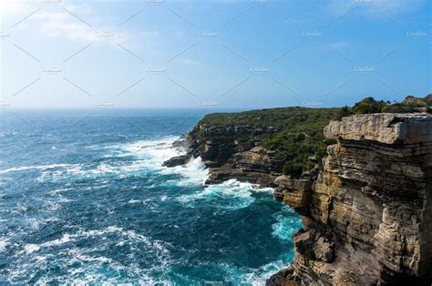 Rough Cliff And Ocean View Nature Stock Photos ~ Creative Market