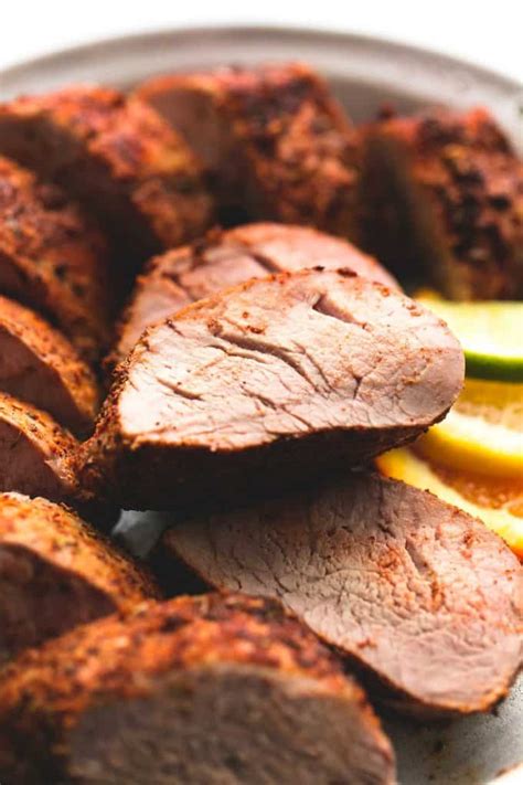 Place broiler pan in the oven then preheat oven to 450 degrees fahrenheit. BEST Baked Pork Tenderloin | Creme De La Crumb