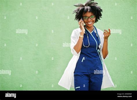 Portrait Of African American Female Doctor With Stethoscope Wearing Lab