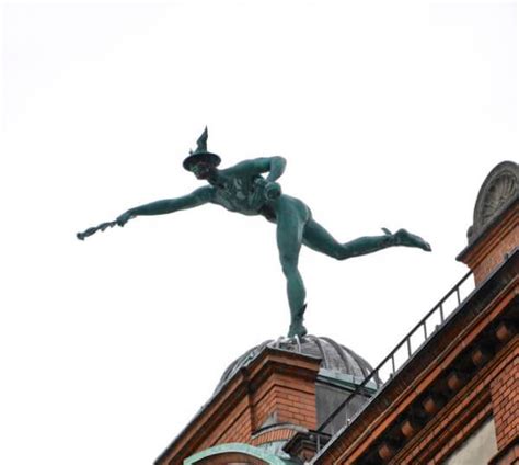 Bronze Statue Of Mercury On Old Pharmacy Building In Copenhagen Joel