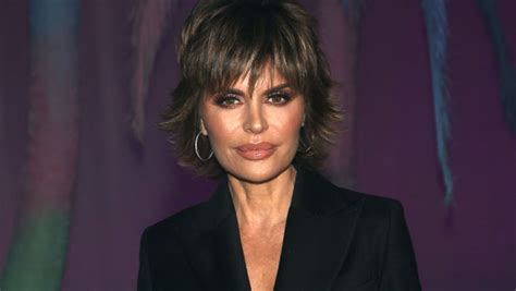 Lisa Rinna Dances In Lingerie With A Blonde Wig In A New Video