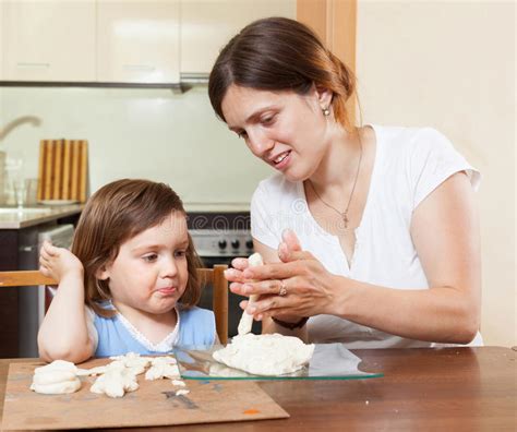 Mom Teaches The Girl To Mold Dough Figurines Stock Image Image Of