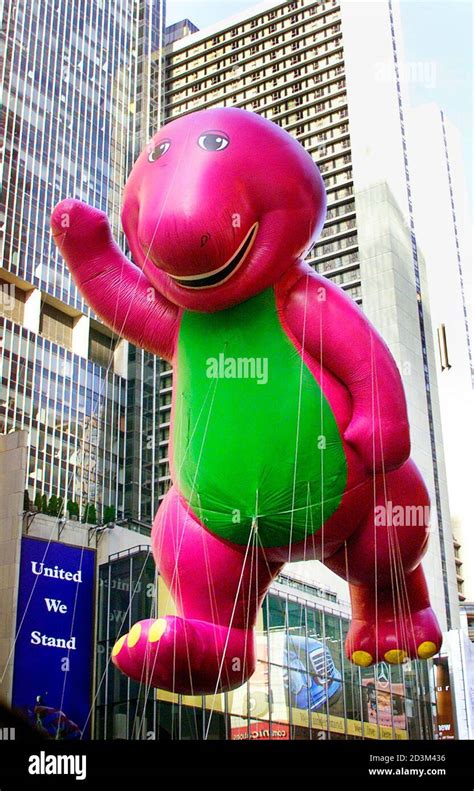 The Barney Ballon Waves To The Crowds Along Broadway During The 75th