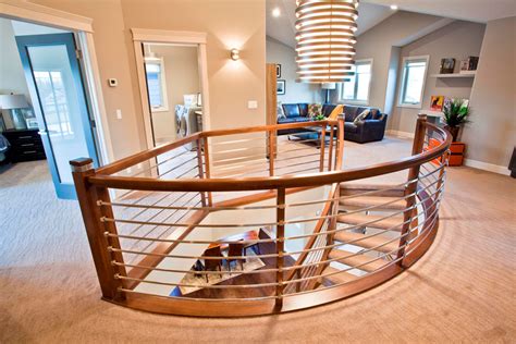 Stainless steel glass pendant connecting stainless steel glass railing standpipe and glass, the bearing is very important, the thicker the thickness of the glass pendant, the better the bearing effect. Stainless Steel Railing System | Artistic Stairs Canada