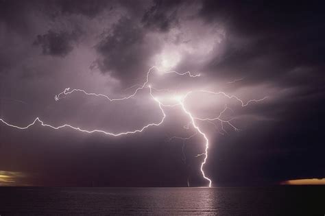 Dramatic Lightning Flashes Over Water Lightning Flash Lightning