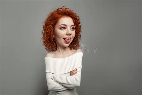 Young Beautiful Lady Showing Her Tongue Stock Images